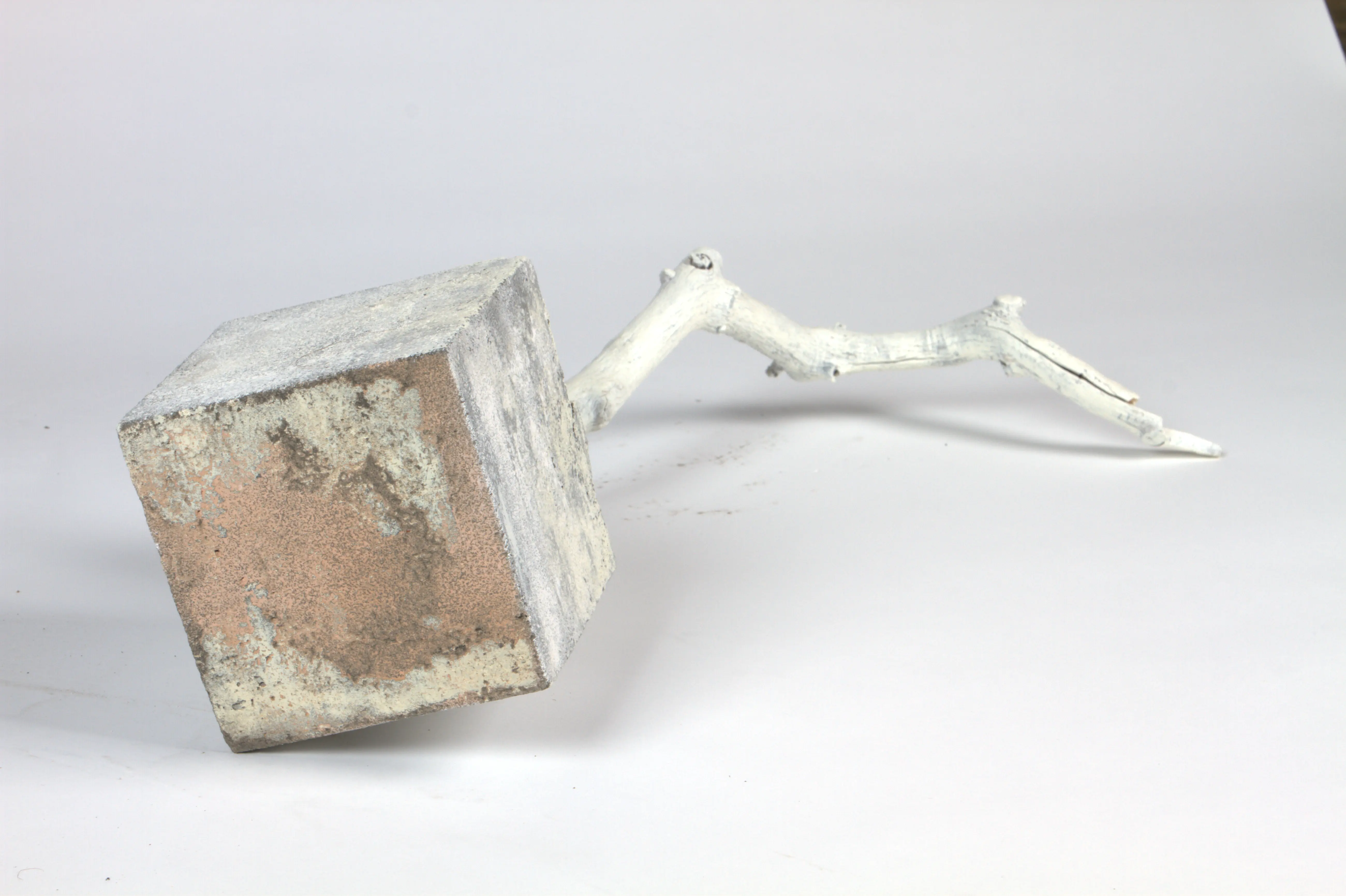 Distressed pink and white block with wood tail sculpture