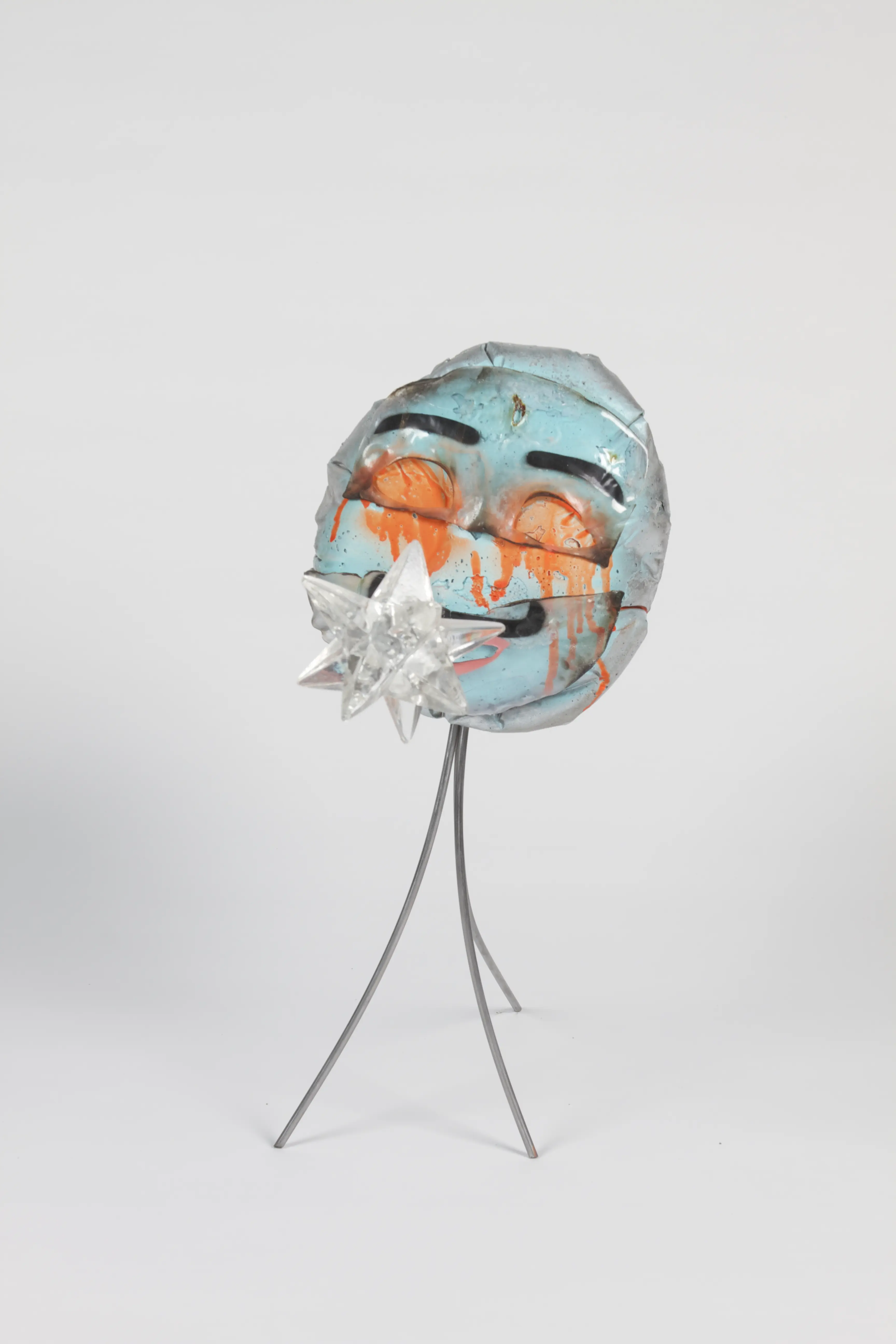 Crying star boy concrete sculpture
